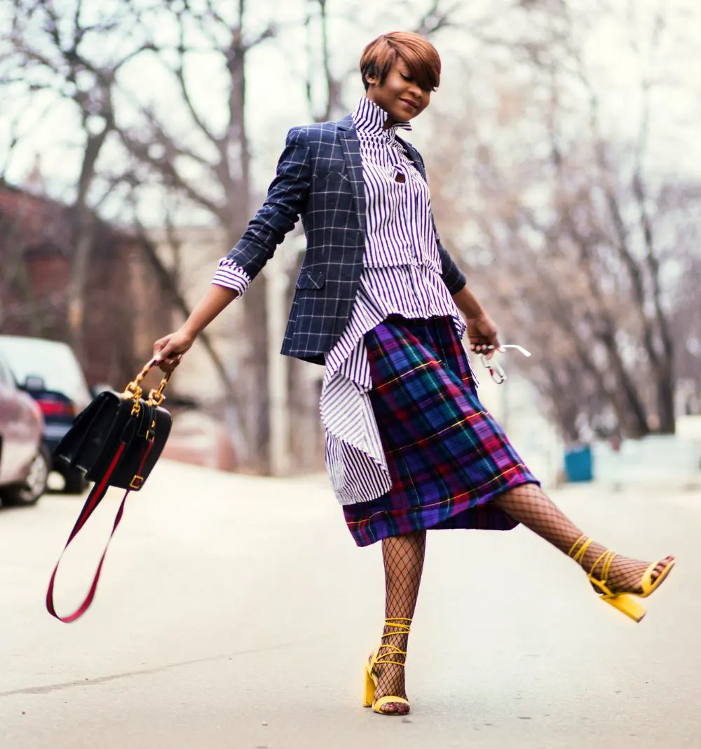 Female with a skirt and blouse in the street