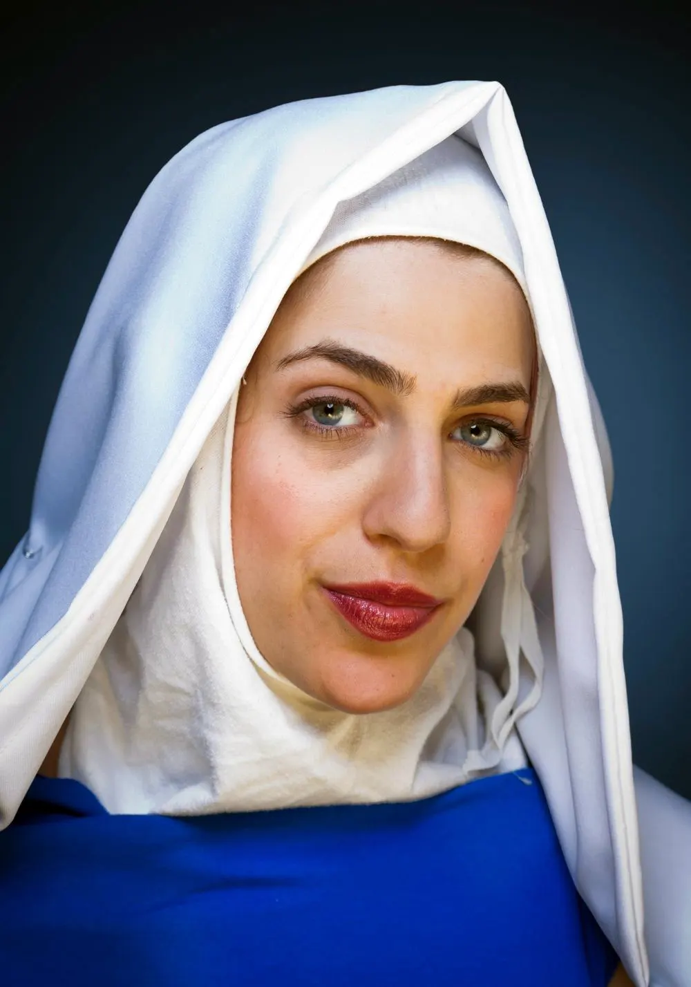 Beautiful Nun wearing blue dress