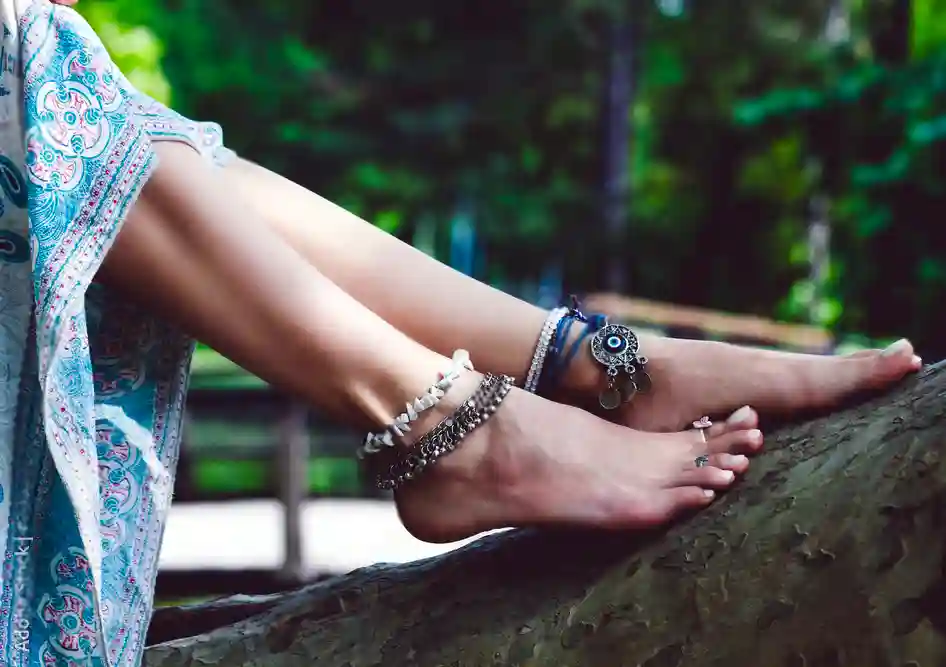 Girl legs wearing anklets