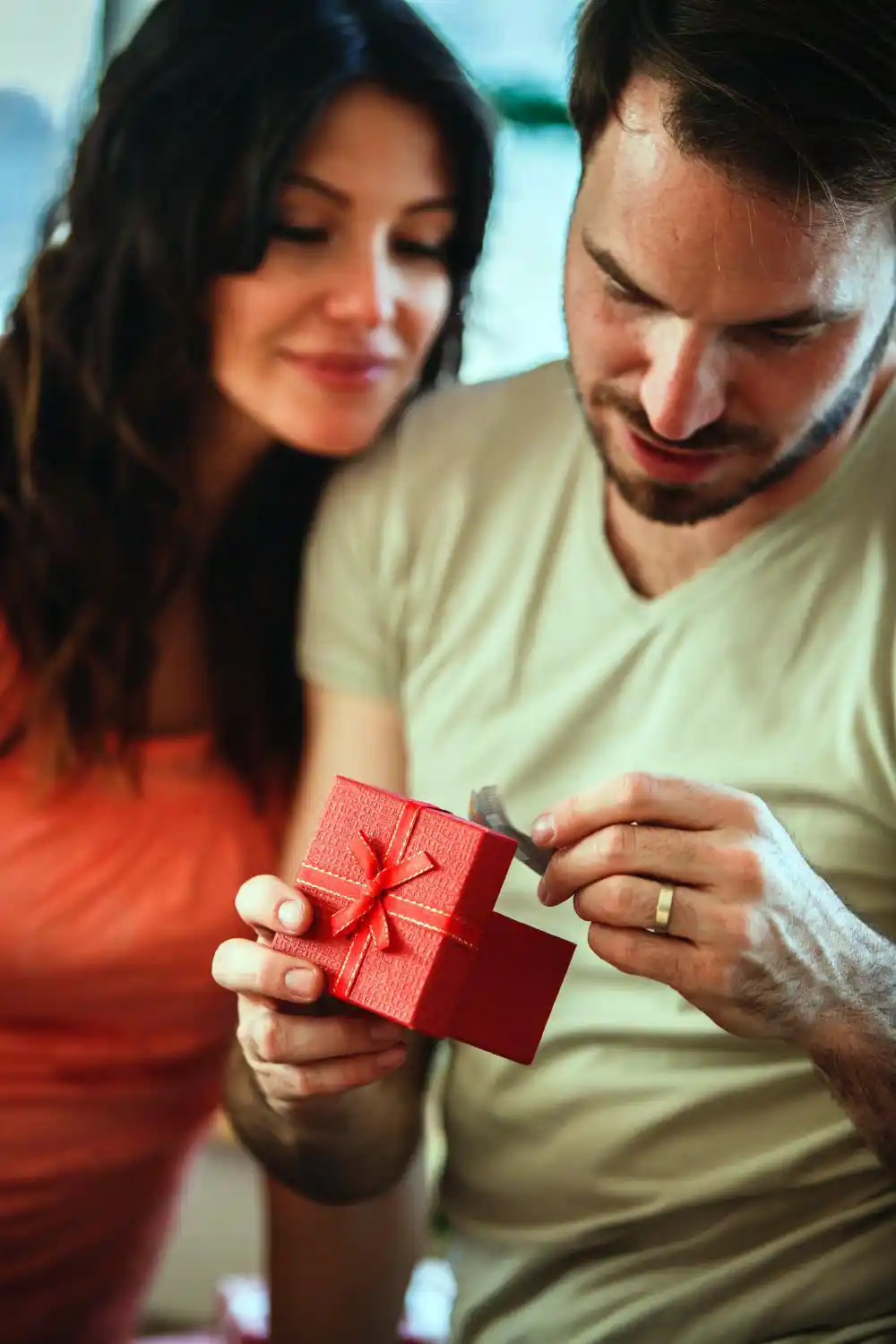 Girl gives gift for him