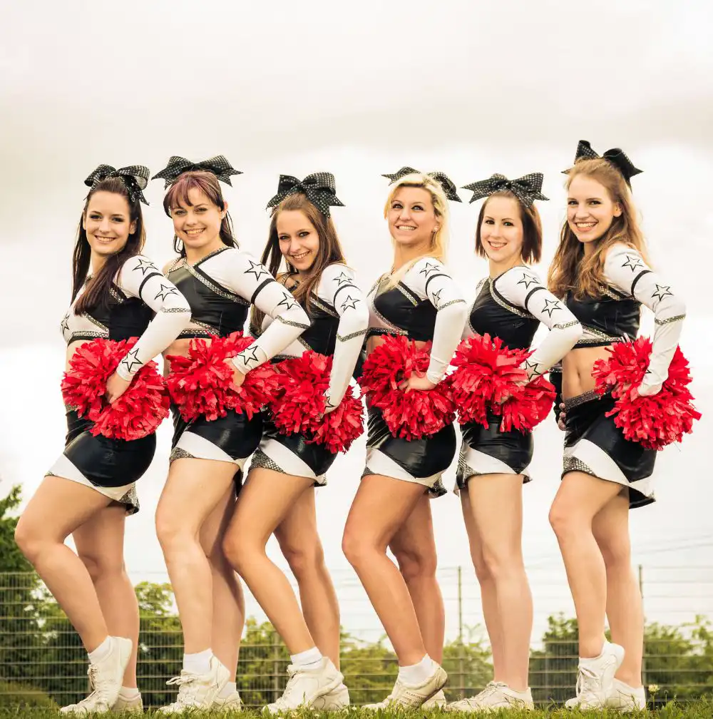 Cheerleaders rooting for their team