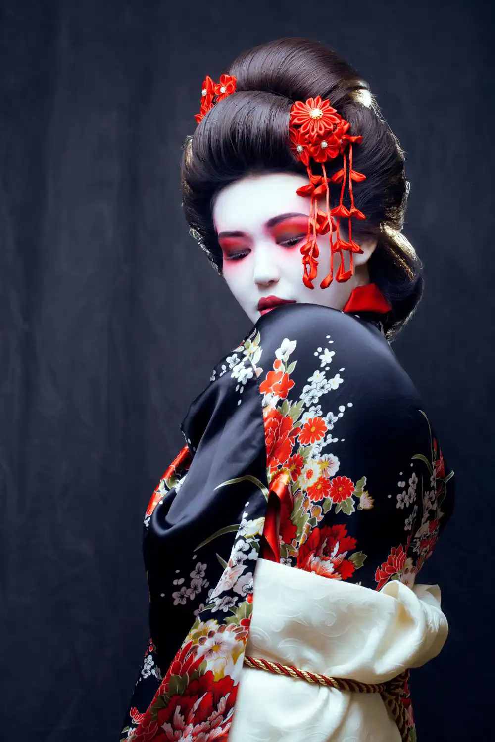 Geisha in kimono with sakura and decoration