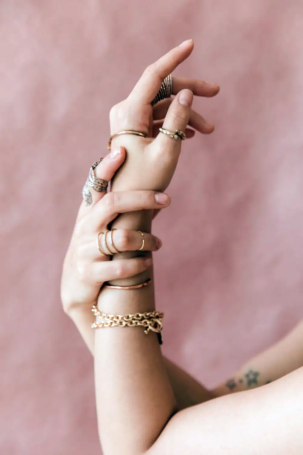 Girl Wearing Gold Bracelet and Rings