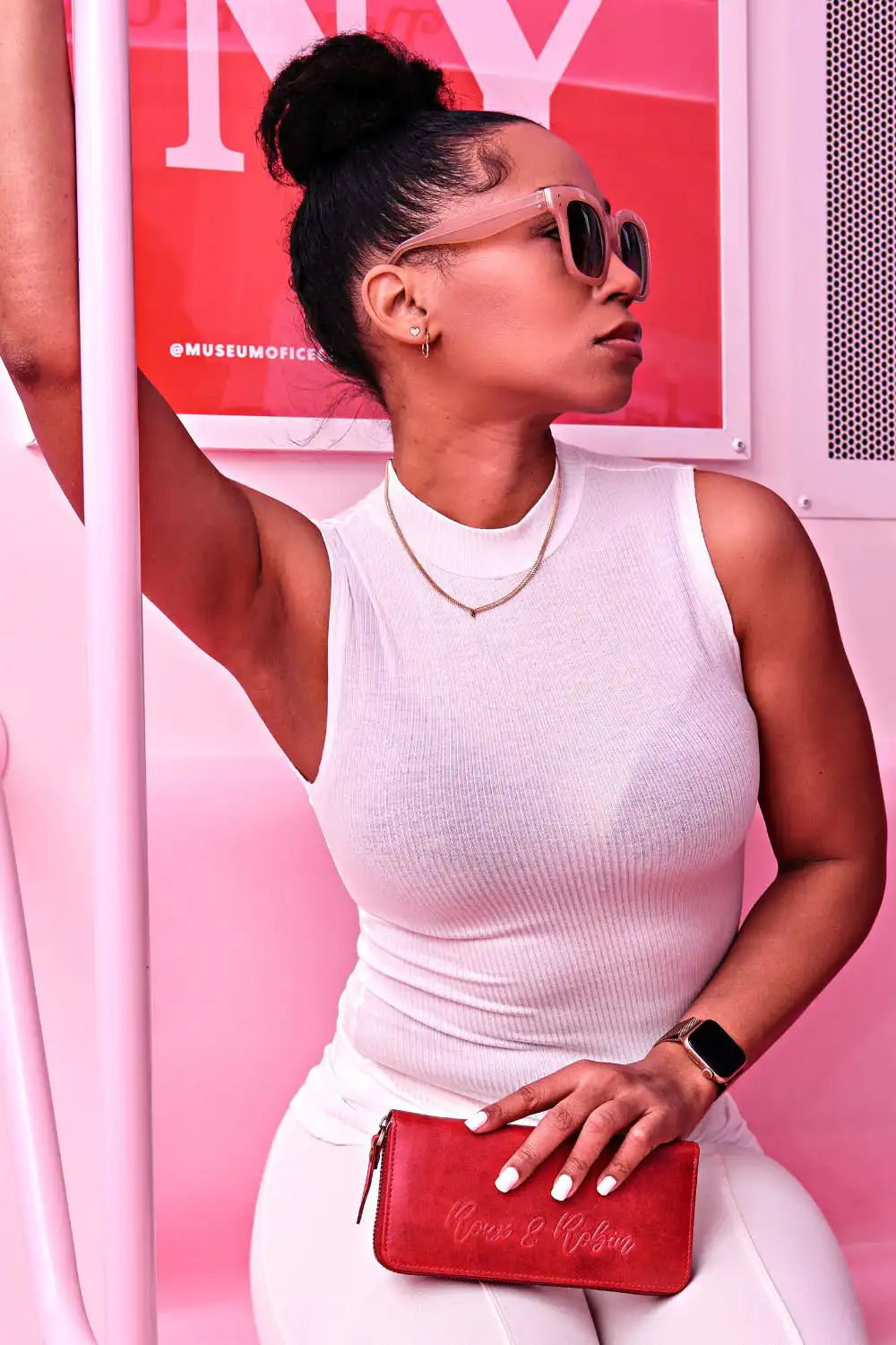 Woman in Pink Tank Top Wearing Sunglasses