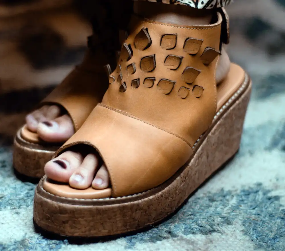 Girl wearing brown wedges