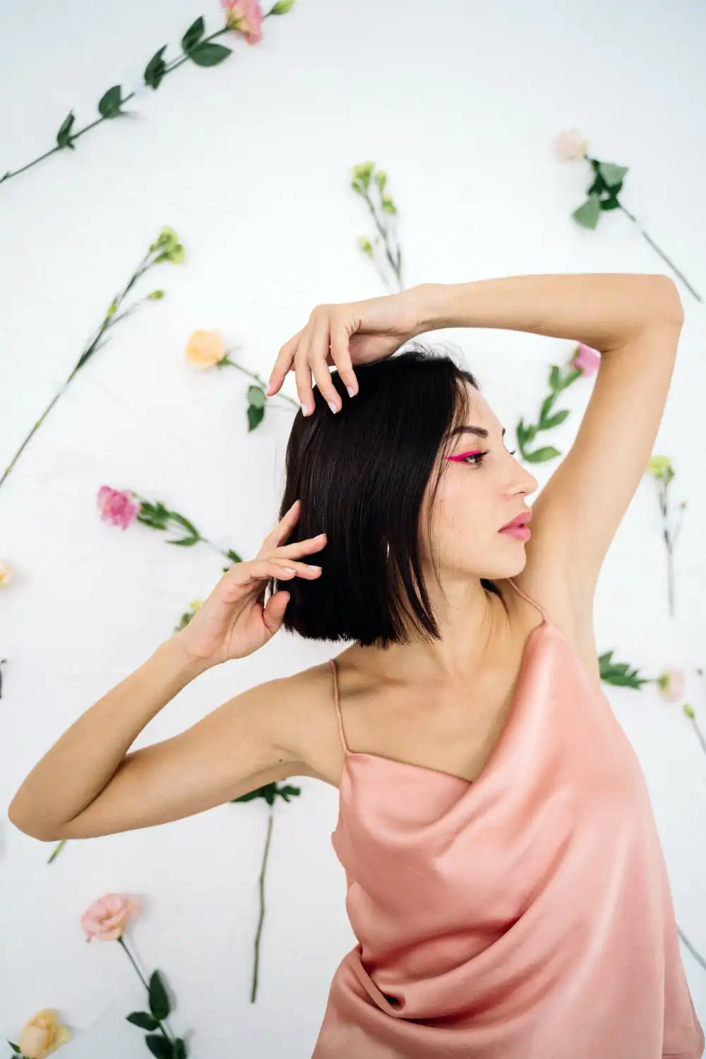 Woman in pink sleeveless blouse